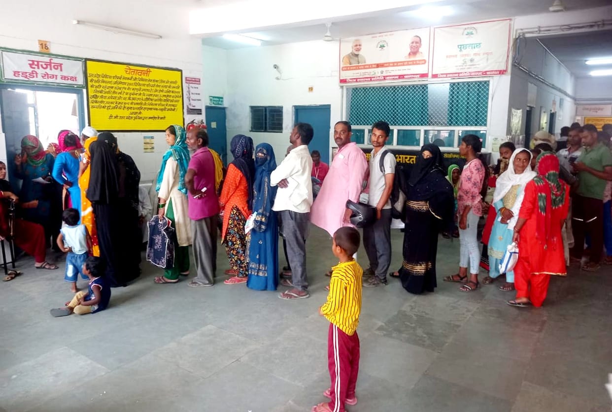 Crowd of patients from counter to OPD