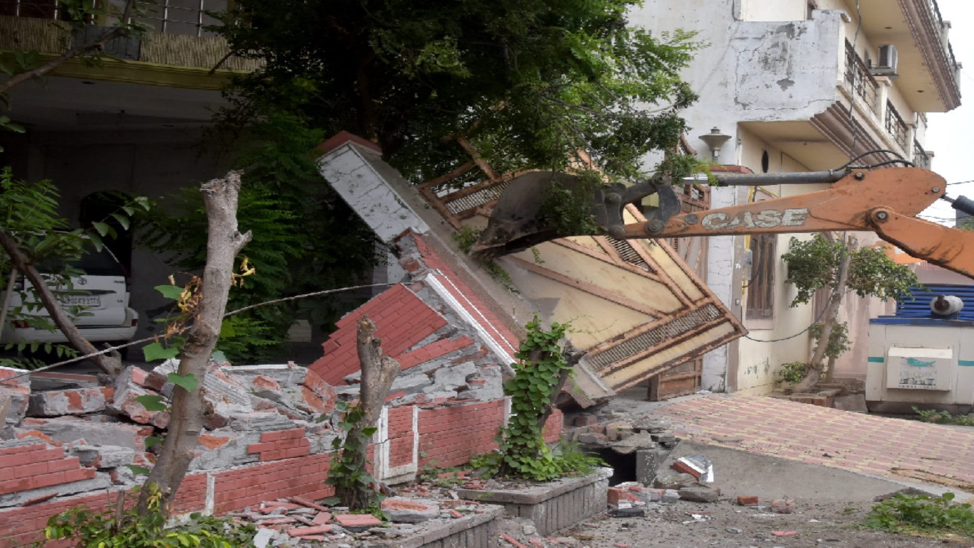 Bulldozer action in Pictures, three houses  of Haji Iqbal and Mahmud Ali demolished in few hours in Saharanpur
