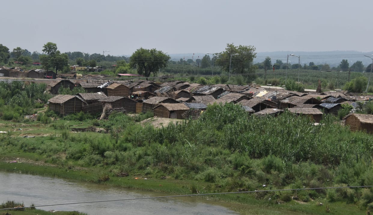 rivers overflowing, migrants fearless on the shore