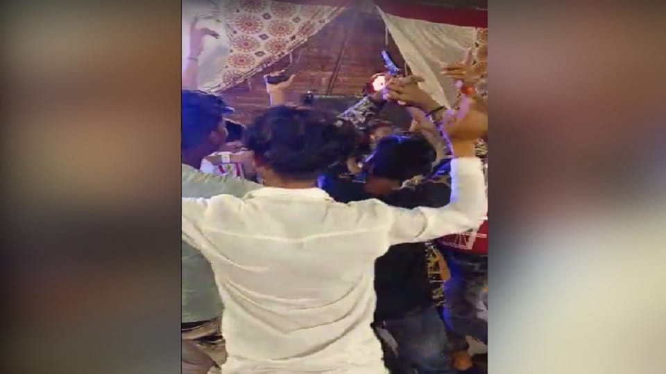 Bikers gang members dance with guns and pistols on DJ in Badaun