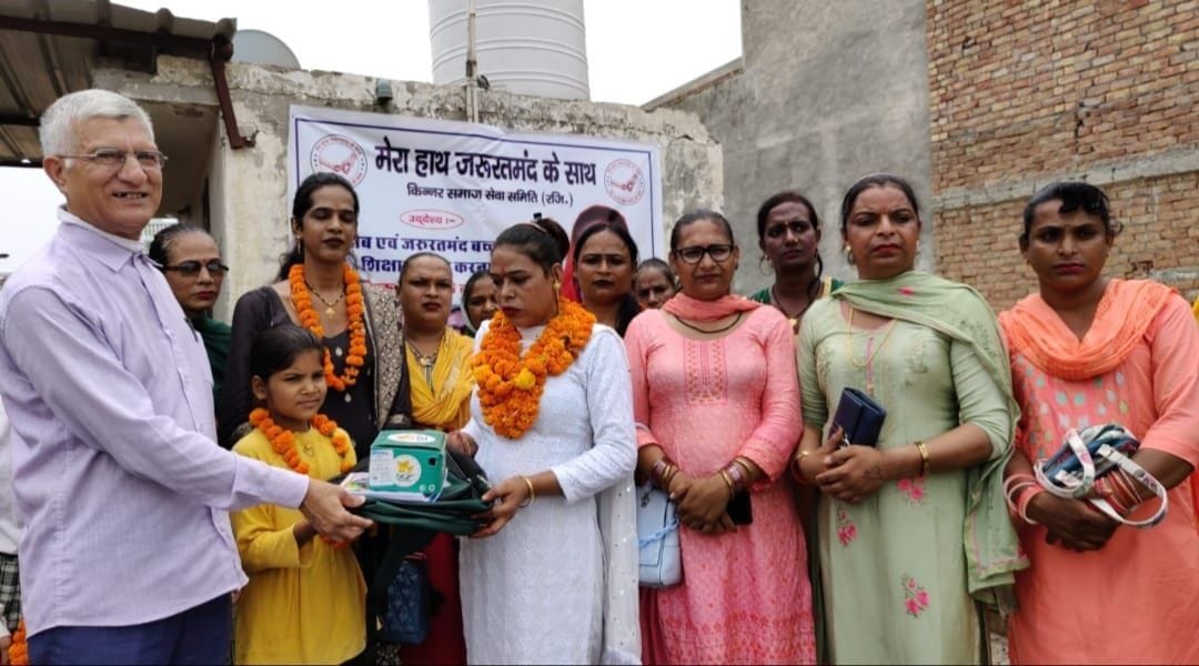 Distributed textbooks and clothes to 25 needy children