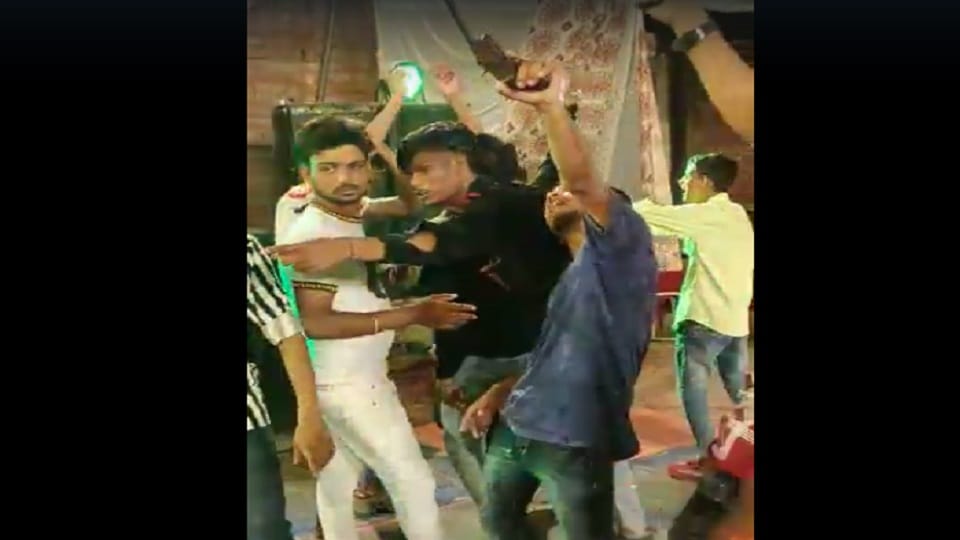Bikers gang members dance with guns and pistols on DJ in Badaun