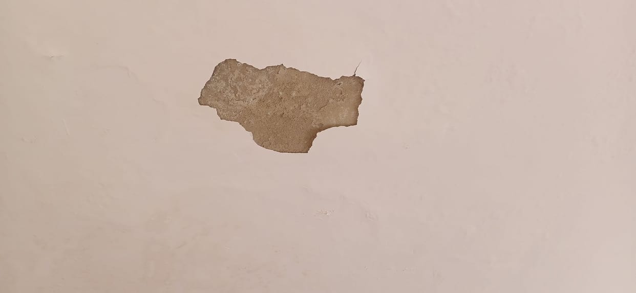 cracks in the walls of the multipurpose hall built in the government college