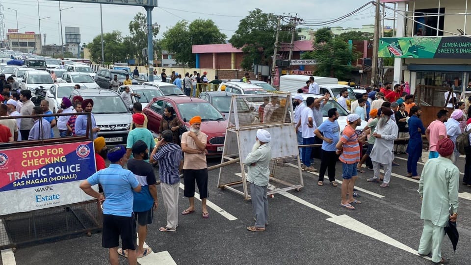 People blocked kharar chandigarh highway in protest against waterlogging