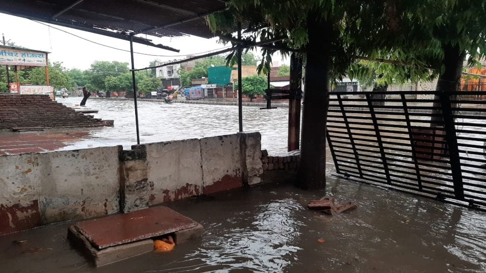 rain water filled in graveyard due to drain wall collapse during rain in Agra