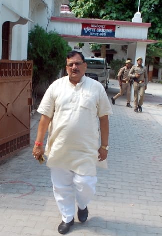 MLA Arvind Giri sitting on a dharna over his displeasure with the police