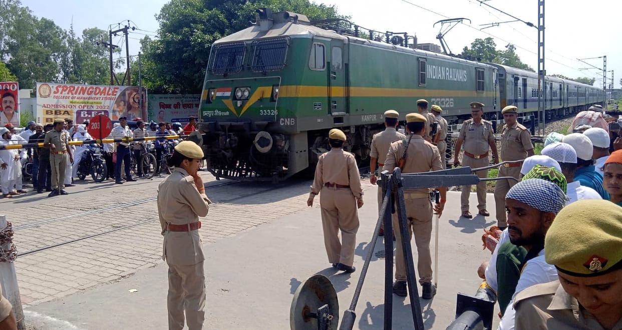 Trains passing at the speed of ten at Idgah railway crossing