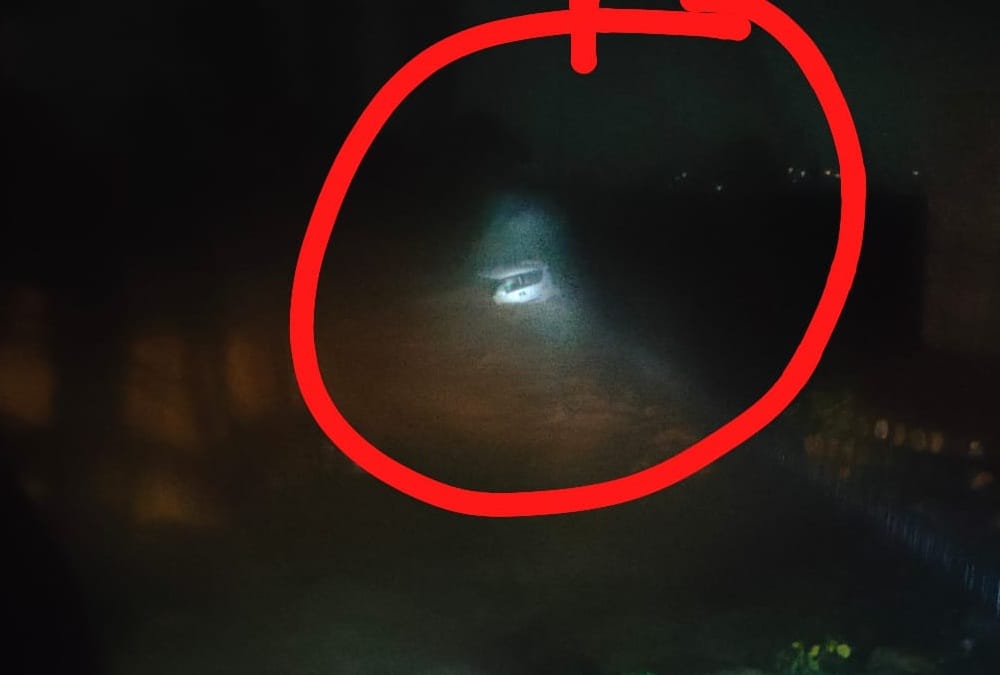 Dehradun weather: Car swept during in heavy flow of flood and Youth died photos