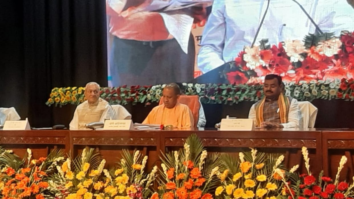 CM Yogi Adityanath distributes share certificate to Sugarcane Farmers