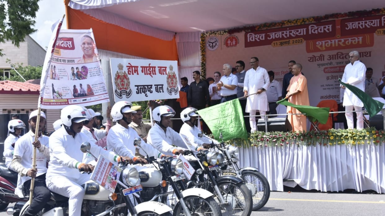 CM Yogi Adityanath flags off a bike rally on World Population Day.