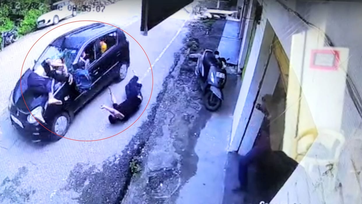Car collided with two pedestrians, incident captured on CCTV
