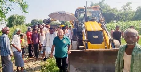MLA arrived with JCB to repair the severed dam