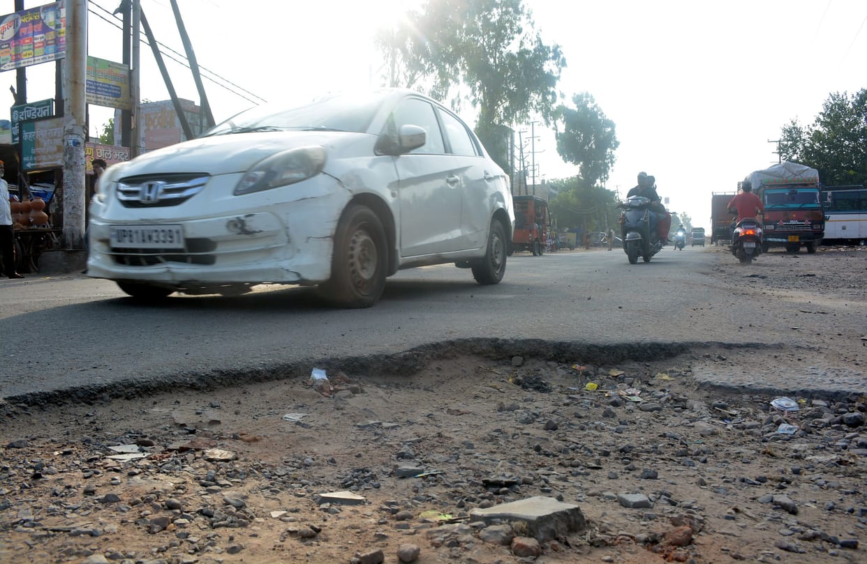 City or countryside... potholes on the roads