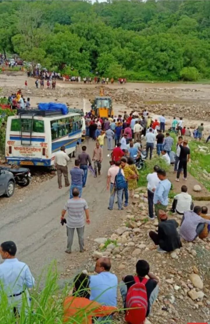 eacher's car book in Dhangarhi drain