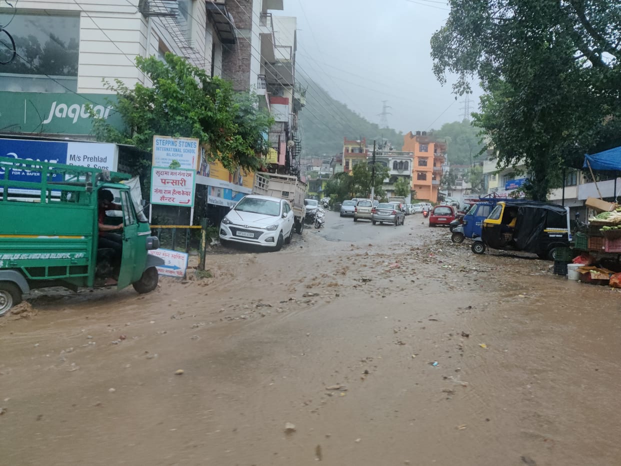 House damaged due to rain, water flowing like drains on the roads