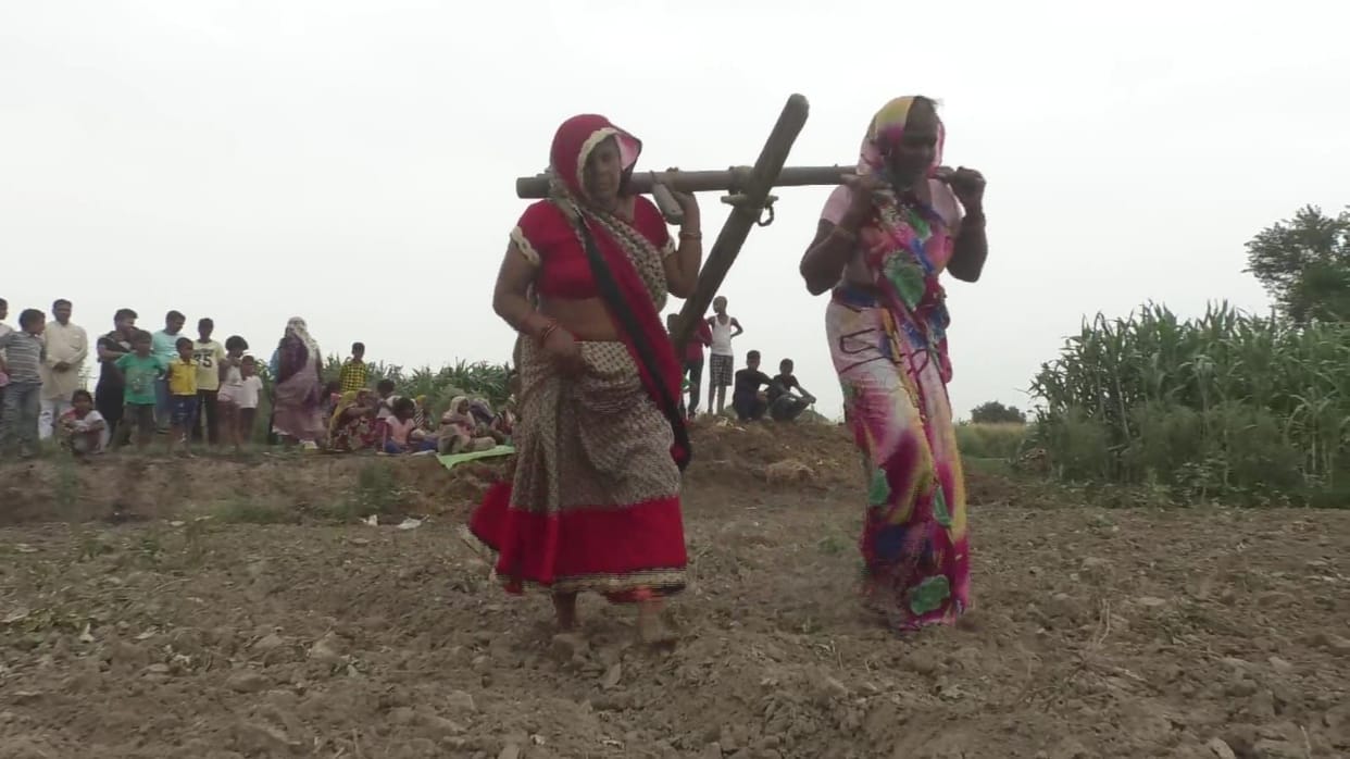 For rain in Etawah, women themselves pulled the plow in the field