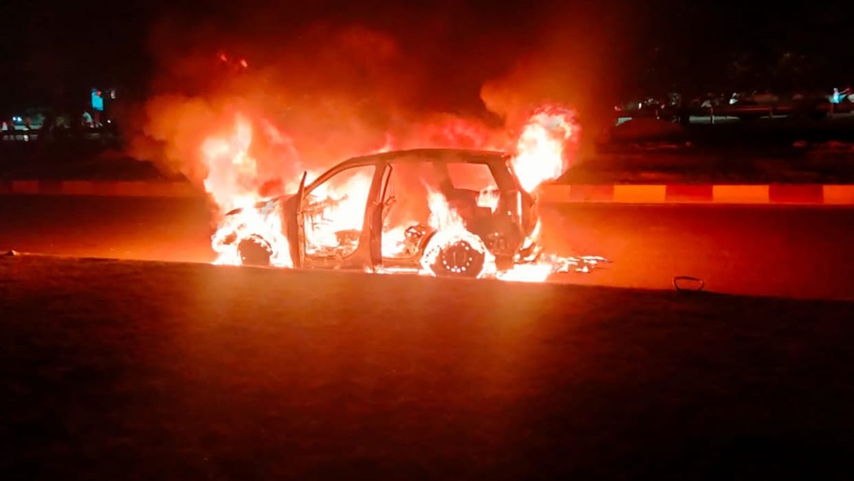 Fire in car of a businessman going back after shopping from Lulu Mall