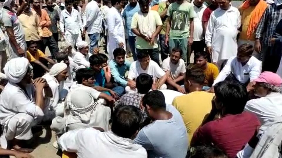 Vegetable vendors block road in gohana against case of shed collapsed in vegetable market