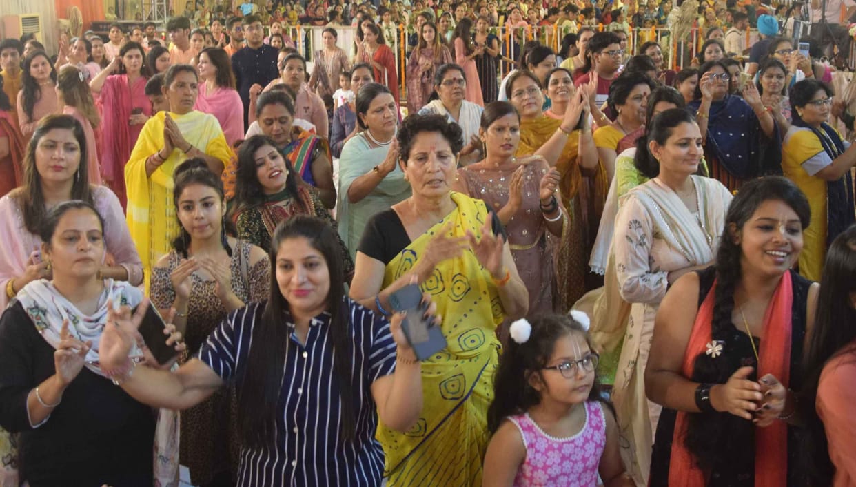 'O Shyam Re I need you...' Devotees dance on the hymn