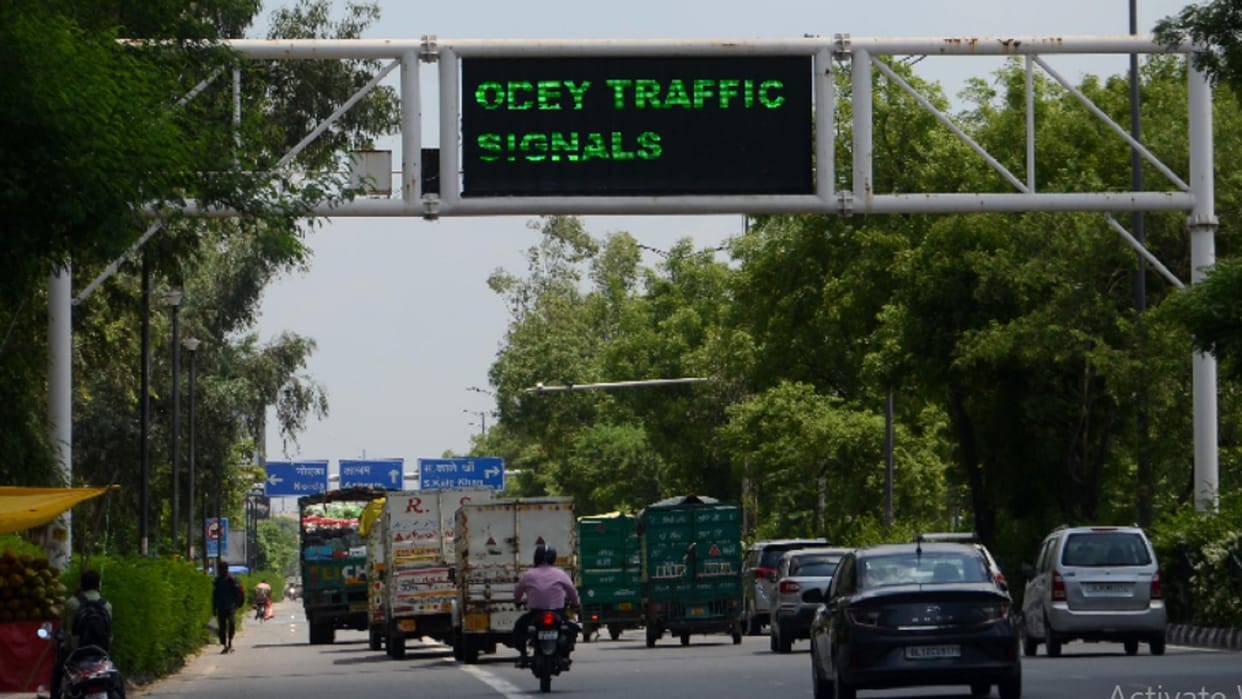 Delhi's traffic police will tell - the road ahead is jammed... the rain is also coming