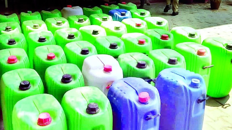 police busted illegal liquor factory in the building material warehouse in etah