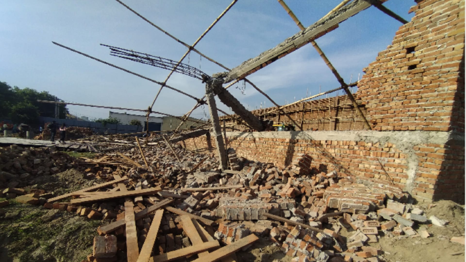 Under construction Warehouse wall collapses In alipur of delhi Many laborers died after being buried in rubble