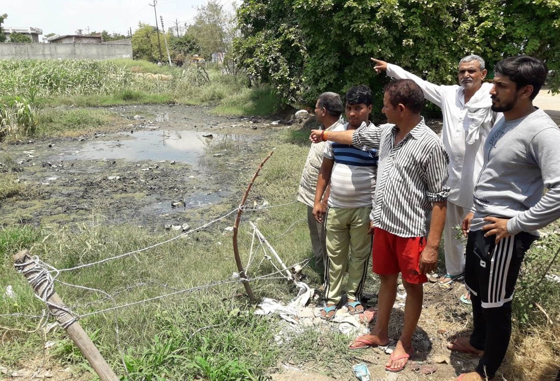 Farmers protest against chemical-rich water entering the fields