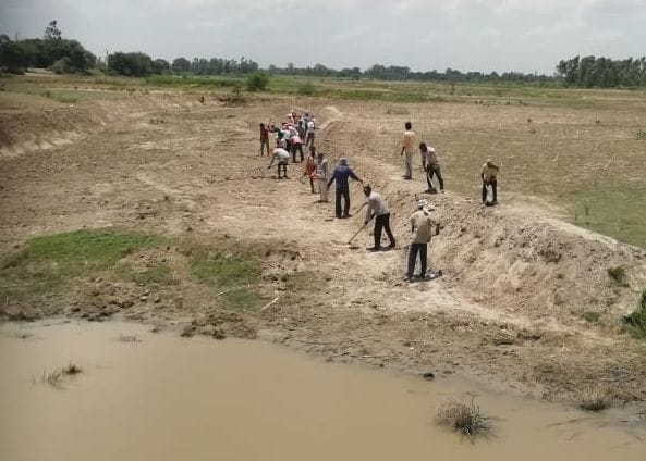 MNREGA workers cleaned the river