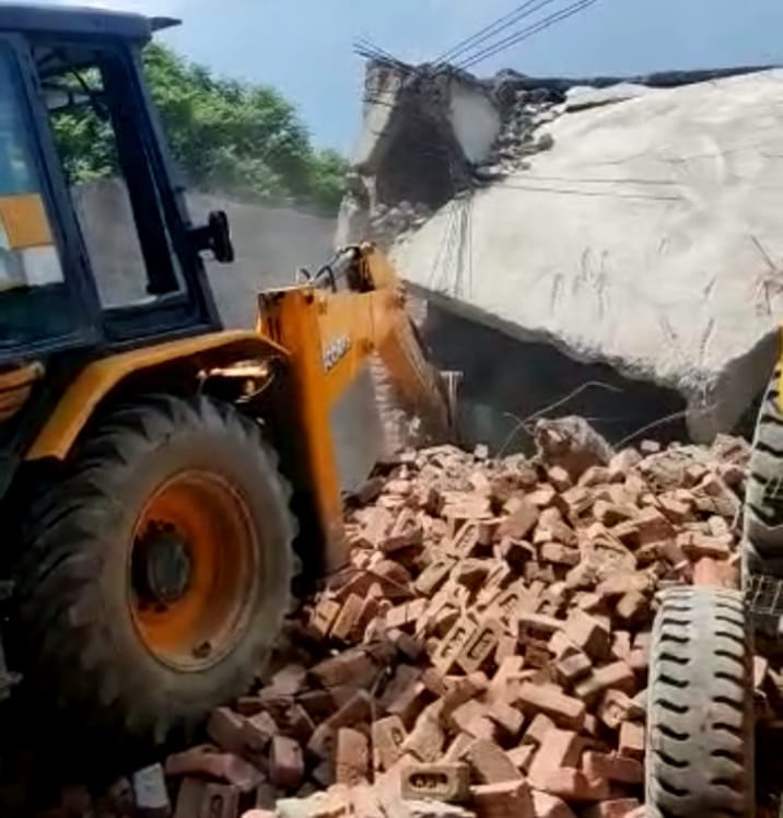 Bulldozers run on madrassa built on the land of village society