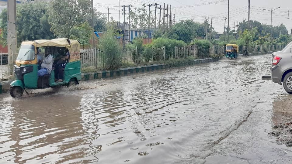 roads filled with water after heavy rain in faridabad highway jammed