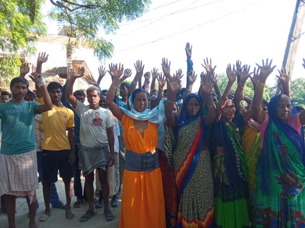 Angry villagers protest at police station