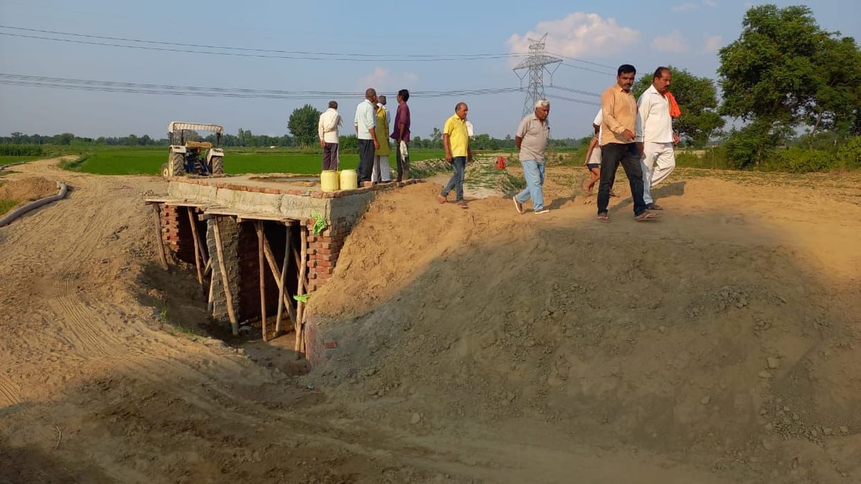 Leaving hope from the public representatives, the farmers made a bridge over the Neem river