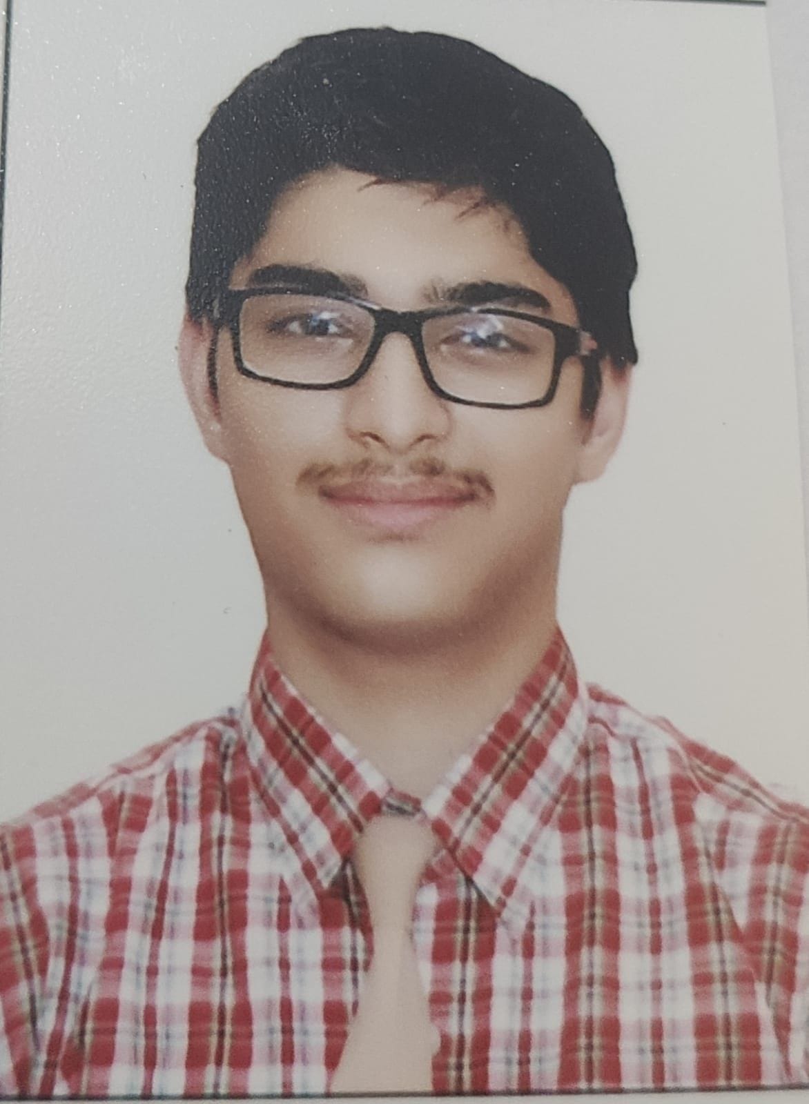 sarthak scores 99 % become Gautam Buddha Nagar topper