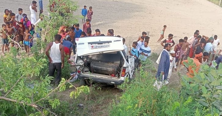 Van overturns in ravine, two killed