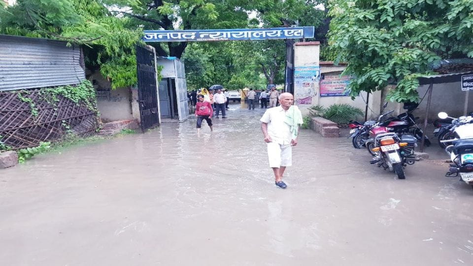 water logging in government office and road due to heavy rain in etah