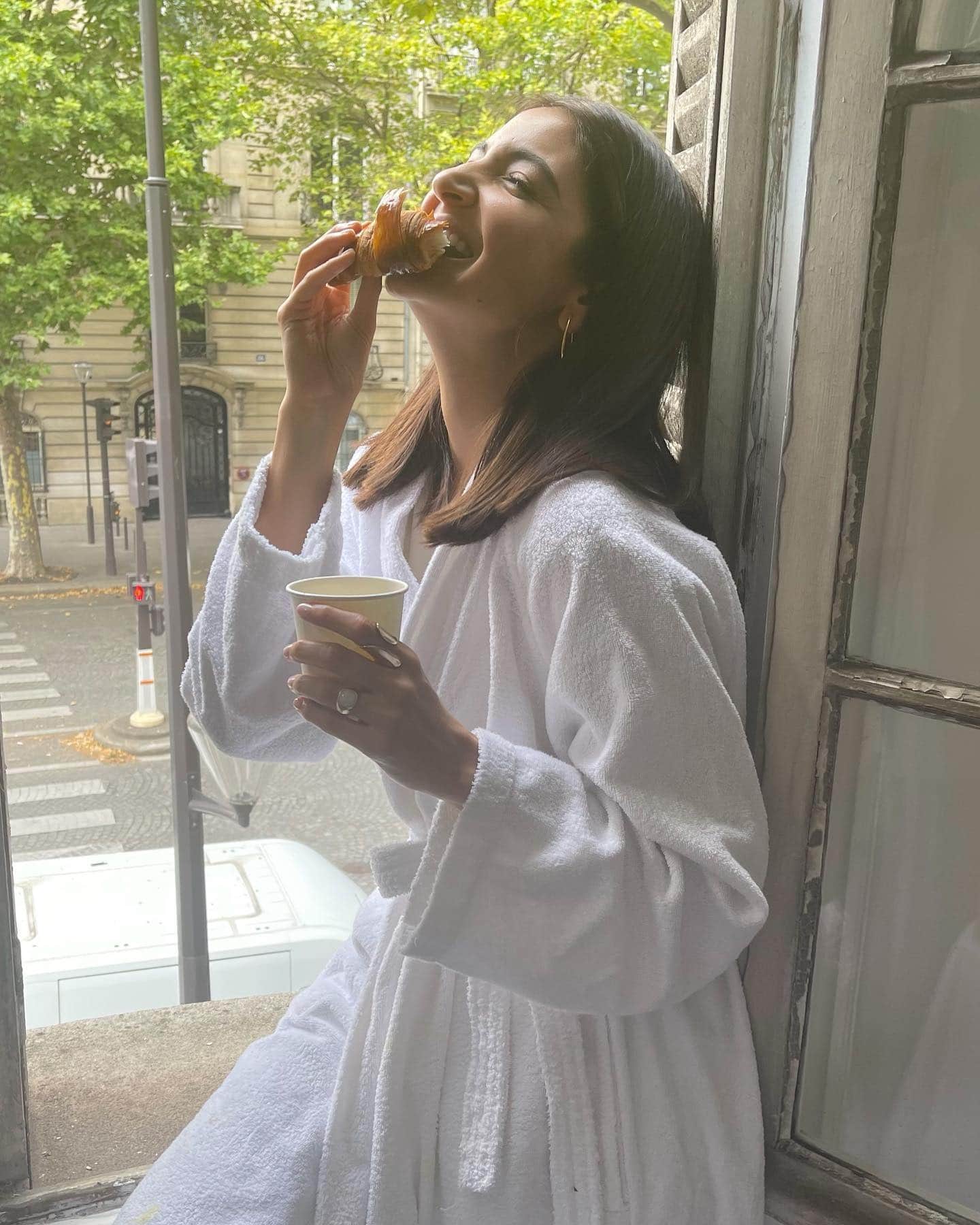 Anushka sharma shares her photos from paris vacation eating  croissants with coffee