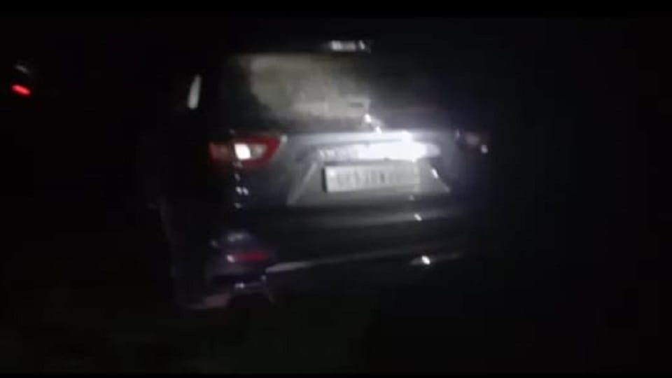 Arrested for killing son after being trampled by car
