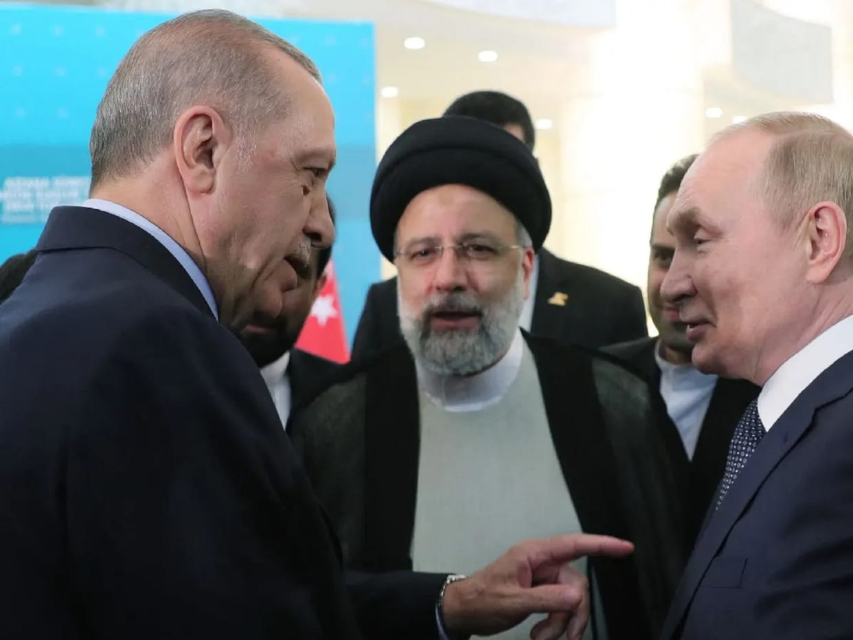 Russian President Vladimir Putin, in Tehran, gets strong support from Iran over Ukraine