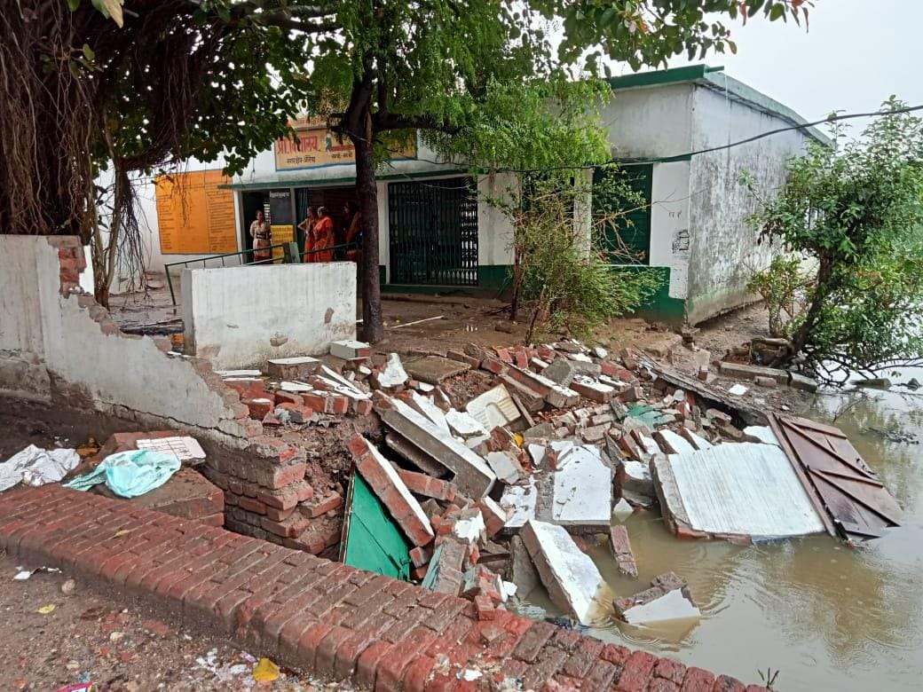 Children studying in a dilapidated school amid danger