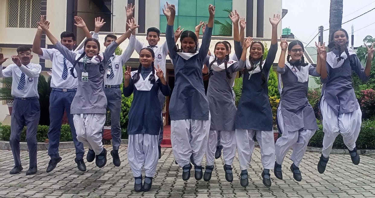 After the result, the students danced with joy.
