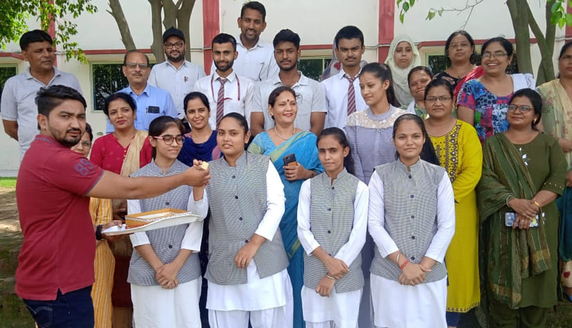 The faces of the students blossomed due to the bumper result in CBSE 12th