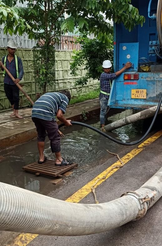 Rain drain caused blockage due to plastic bottle, polythene, pellets