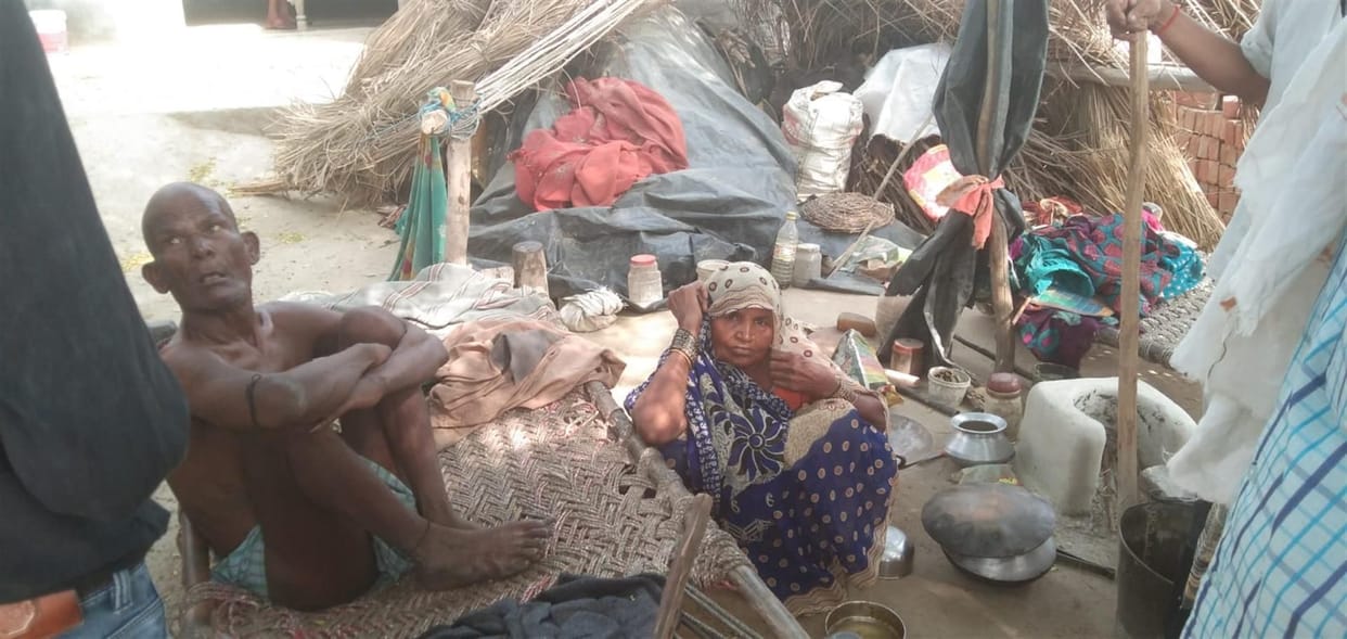 No pension, no ration card, the night passing in the rain under the tarpaulin