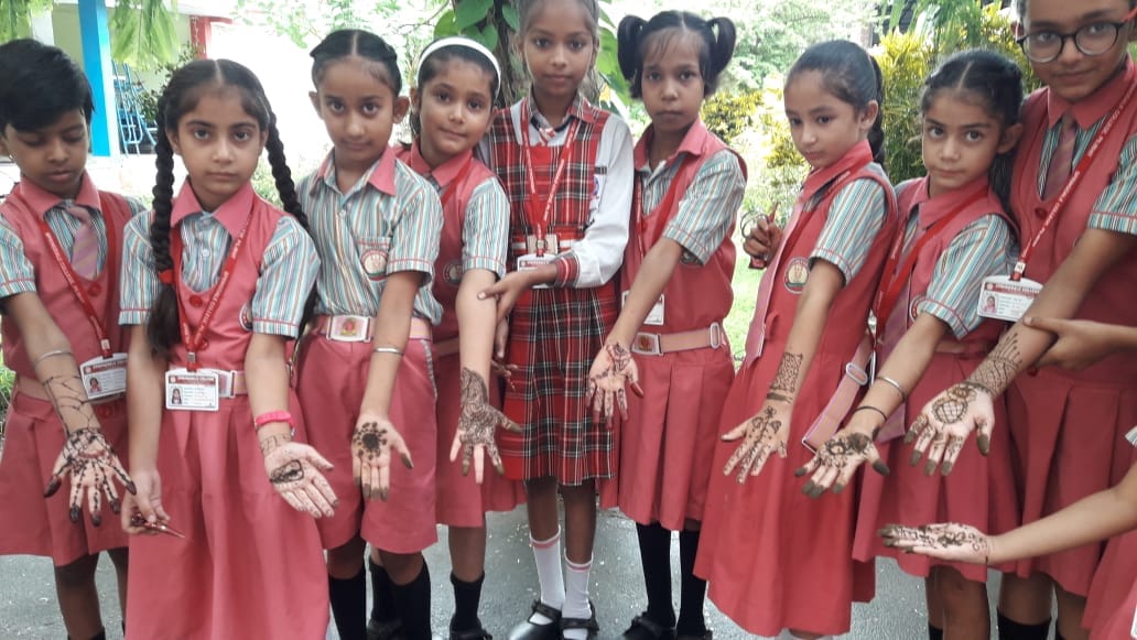 Children adorned in Teej festival captivated their mind