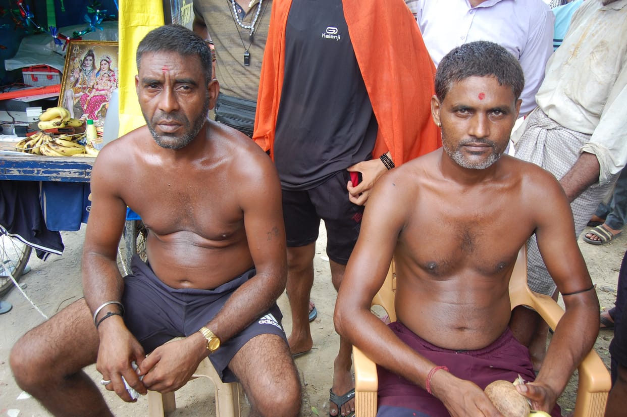 Kanwars brought by putting needles on their backs