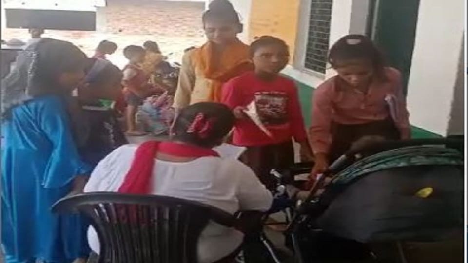 Video of teacher feeding a child in school goes viral