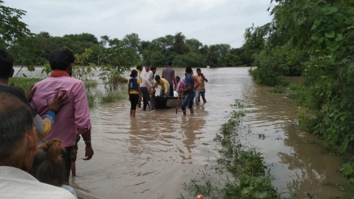 After the roads are closed due to heavy rains in Shajapur