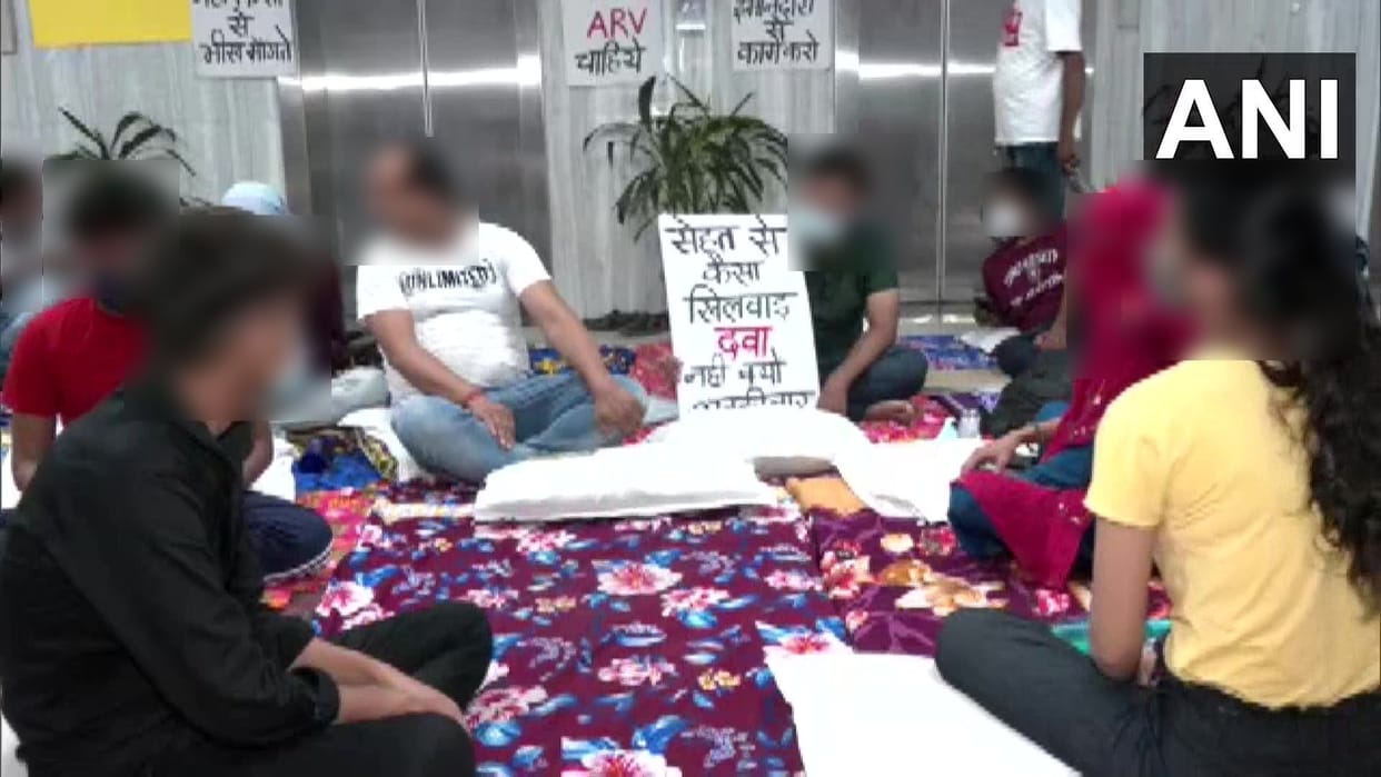 HIV patients protest outside the National AIDS Control Organization office in Delhi