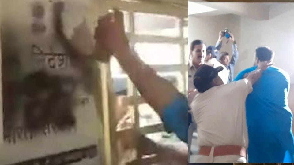 Indore: Congress leader throws soot on the board of ED office, beaten up by police