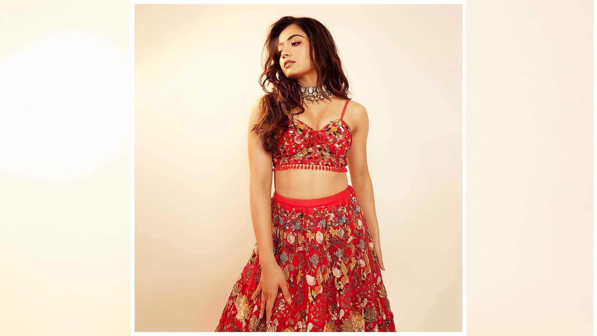 rashmika mandanna glamorous retro look in red pants with strappy crop top
